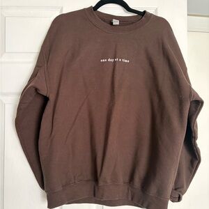 Brown Sweatshirt with Motivational Message